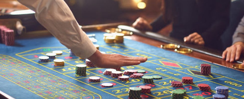 People gambling at roulette poker in a casino.